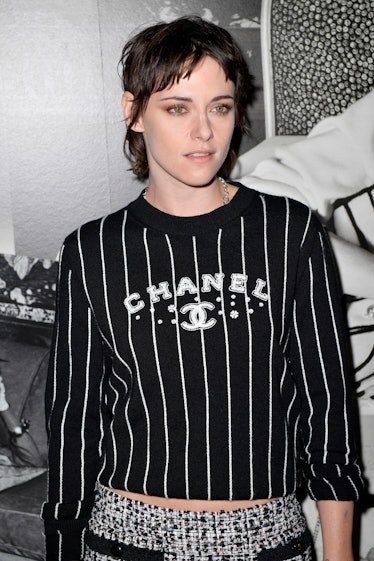 Kristen Stewart with a mullet attends the Chanel Womenswear Spring/Summer 2023 show as part of Paris...