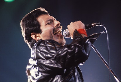 Freddie Mercury of Queen performing in 1980 wearing a black leather jacket.