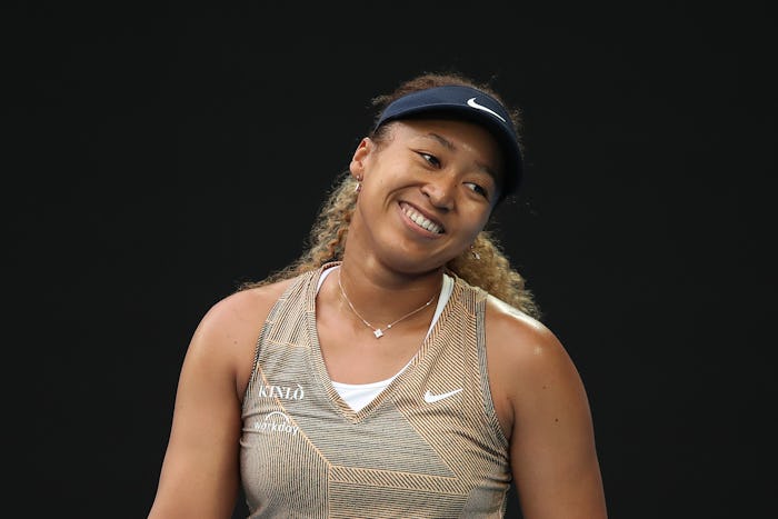 MELBOURNE, AUSTRALIA - JANUARY 06: Naomi Osaka of Japan smiles during her match against Maryna Zanev...