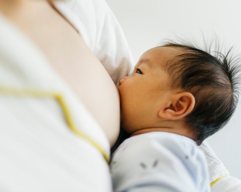 closeup of newborn nursing, how to breastfeed with flat nipples