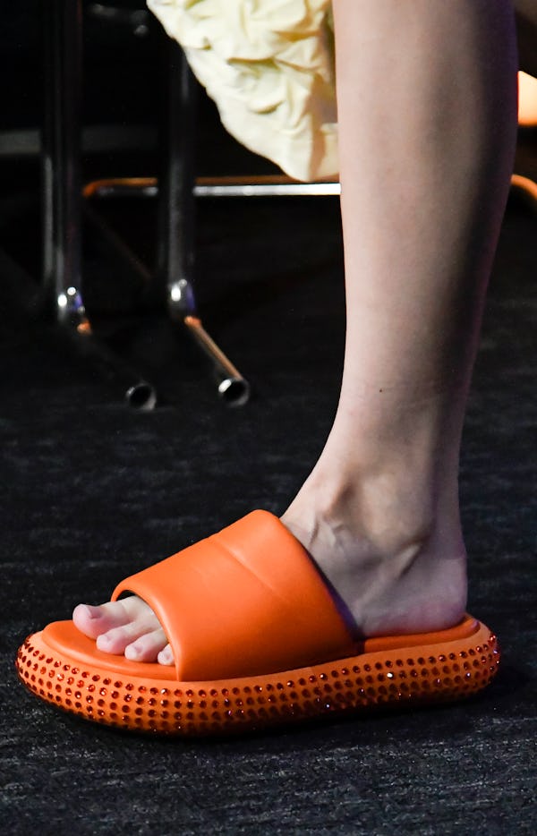 A model walks the runway during the JW Anderson Ready to Wear Spring/Summer 2023 fashion show wearin...