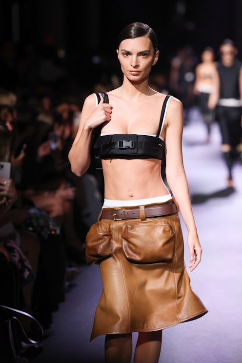 Emily Ratajkowski walks the runway during the Miu Miu Womenswear Spring/Summer 2023 show