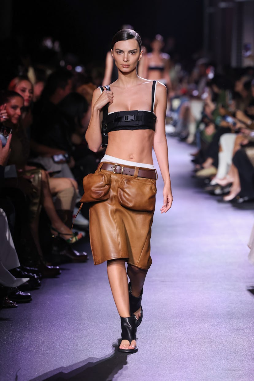 Emily Ratajkowski walks the runway during the Miu Miu Womenswear Spring/Summer 2023 show
