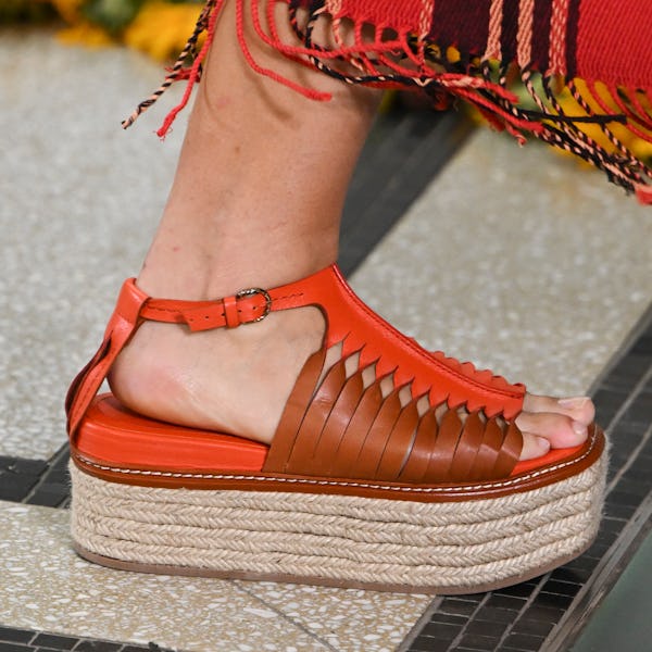 A model wearing the flatform shoe trend walks the runway during the Ulla Johnson Ready to Wear Sprin...