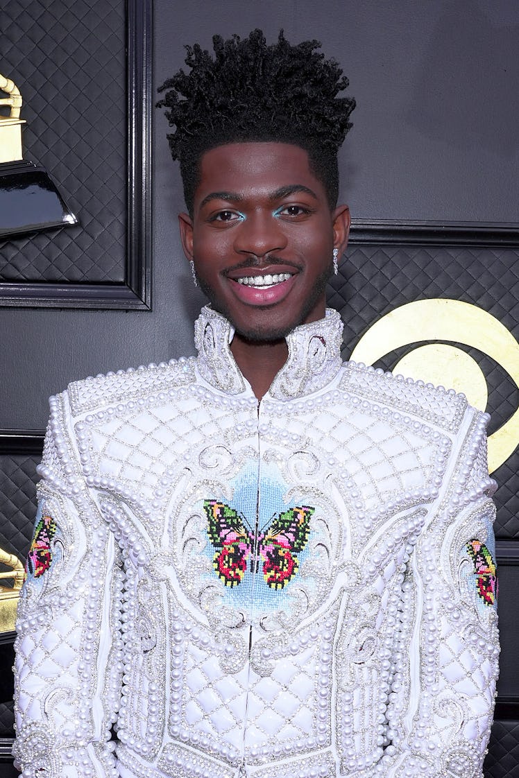 Lil Nas X Halloween costumes for Halloween 2022 include "Montero" album art as seen on his outfit as...