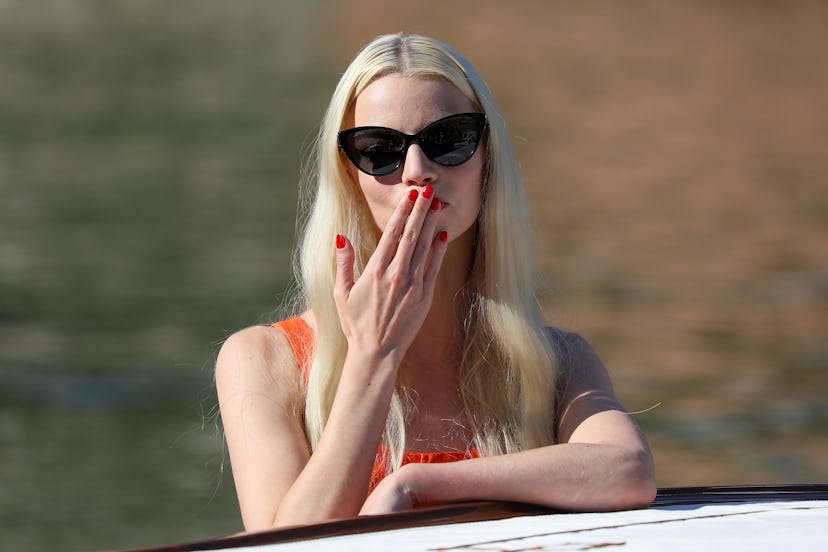 Actress Anya Taylor-Joy arriving and blowing a kiss at the 78th Venice International Film Festival