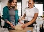Two woman learn how to make the pancake spaghetti TikTok recipe for breakfast. 