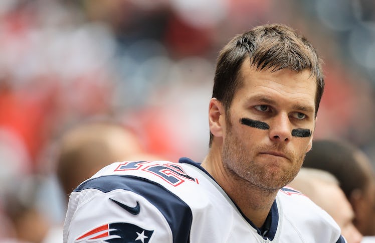 HOUSTON, TX - DECEMBER 01: Tom Brady #12 of the New England Patriots waits near the bench during th...
