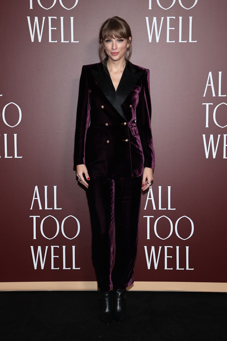 Taylor Swift wearing a purple pantsuit as part of Taylor Swift's style evolution at the "All Too Wel...