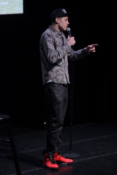 Pete Davidson's Style Evolution: Pete Davidson wears bright red sneakers and camo jacket from the 20...
