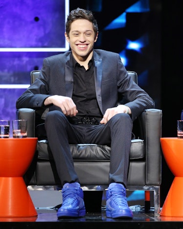 Pete Davidson Style Evolution: his patterned suit and blue sneakers from Comedy Central's Roast of J...