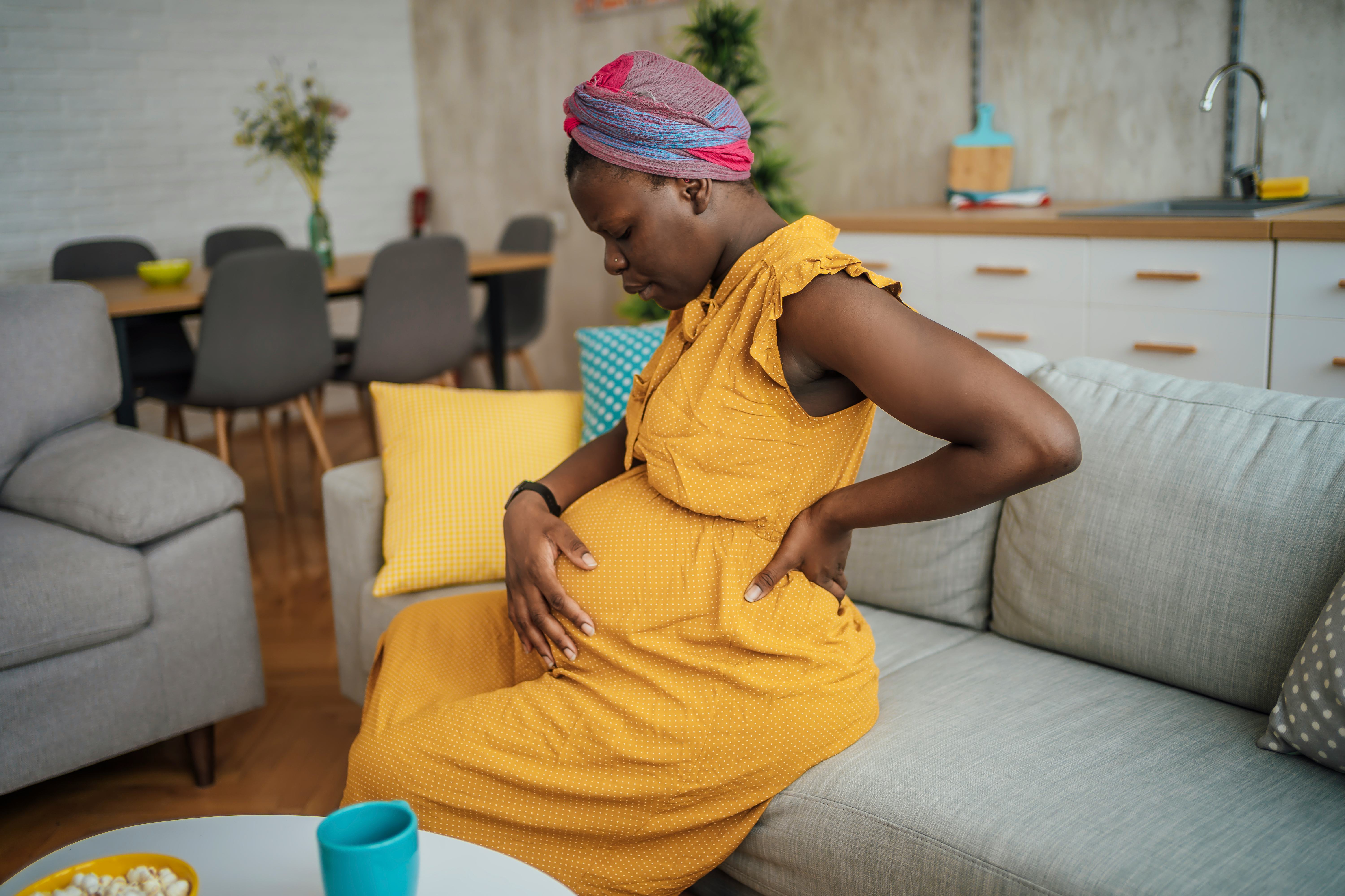 Is My Baby Kicking My Cervix A Sign Of Labor? Doctors Explain