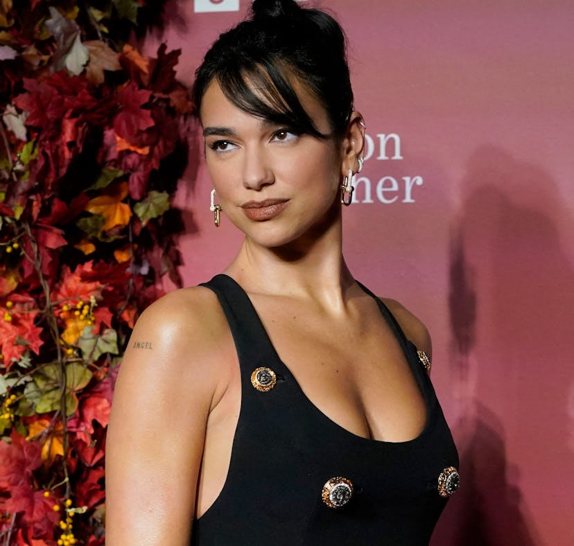 Dua Lipa said she's "alone" amid Trevor Noah relationship rumors.