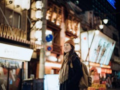 A woman travels around Japan doing the best things to do in Japan from TikTok. 