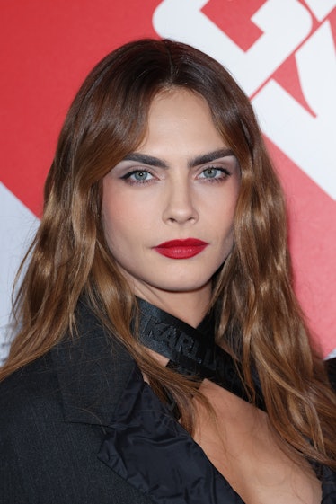 Cara Delevingne with the winter hair color trend for Pisces, cinnamon apple cider hair, on September...