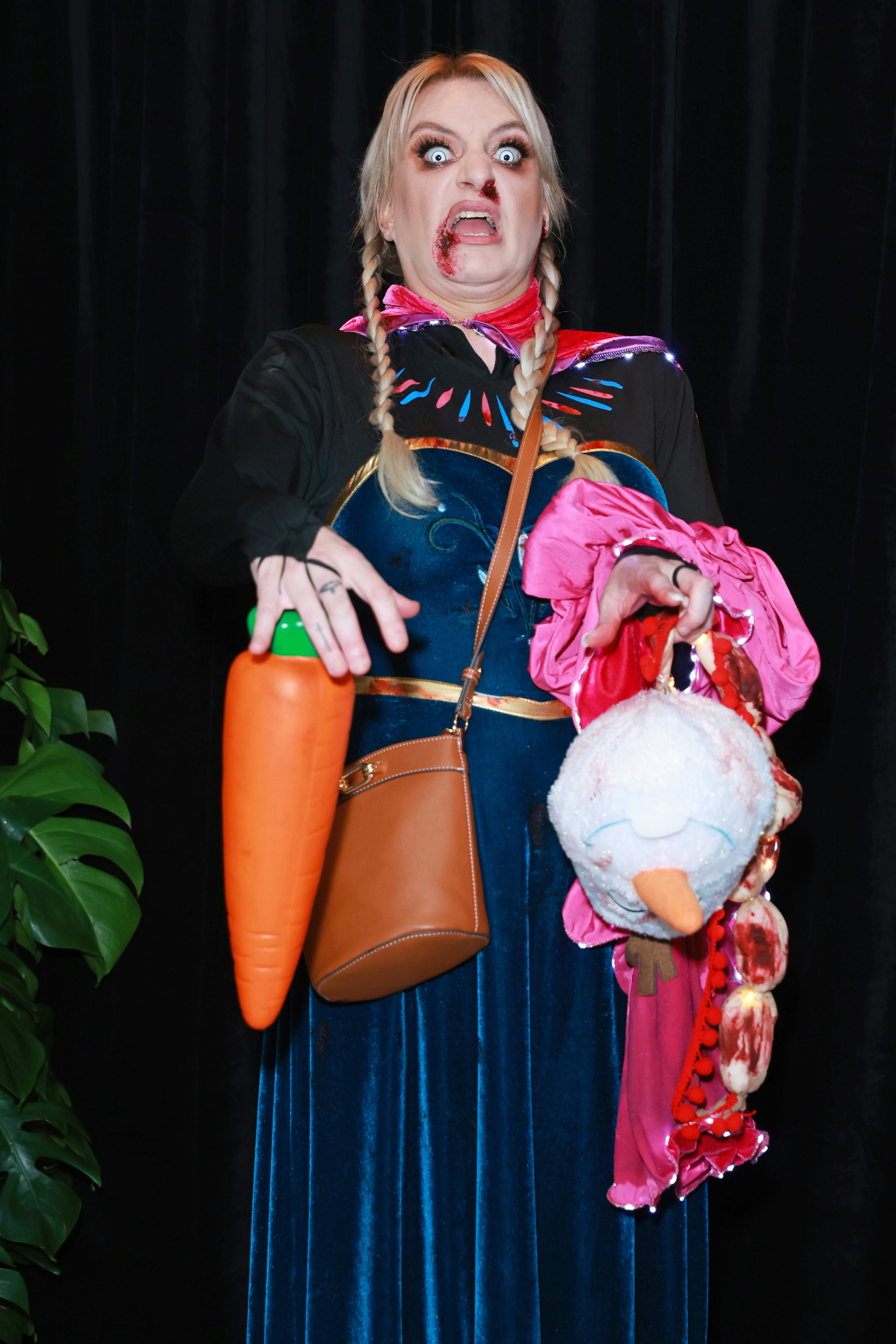Daisy May Cooper as a zombified Anna from Frozen, holding a decapitated Olaf  at Jonathan Ross' Hall&hellip;
