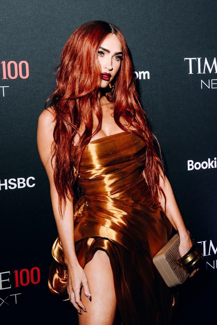 Megan Fox with red hair, the 2022 winter hair color for Aries. (Photo by Nina Westervelt/Variety via...