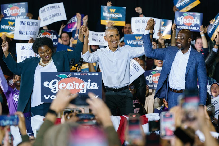 Barack Obama and Stacey Abrams on stage together at her pre-election rally