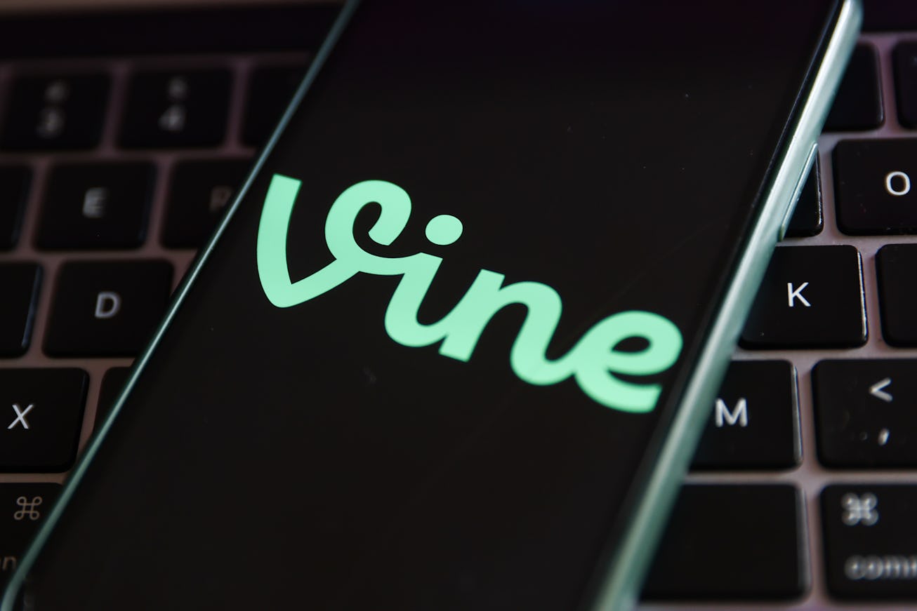 Vine logo displayed on a phone screen and a laptop keyboard are seen in this illustration photo take...