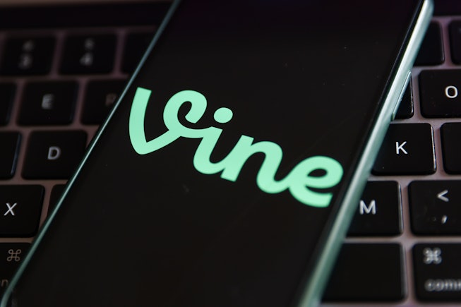 Vine logo displayed on a phone screen and a laptop keyboard are seen in this illustration photo take...