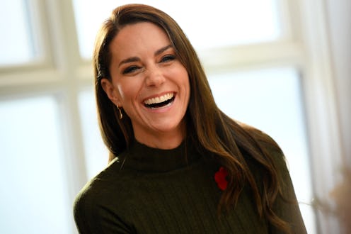 Kate Middleton gave her poppy to a little boy during royal visit.
