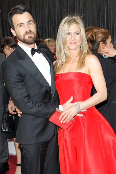 Justin Theroux (L) and Jennifer Aniston attend the 85th annual Academy Awards at the Dolby Theatre. ...