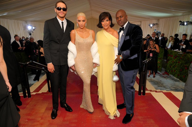 Kris Jenner, who called in Marilyn Monroe's dress, and Kim Kardashian are seen with Pete Davidson an...