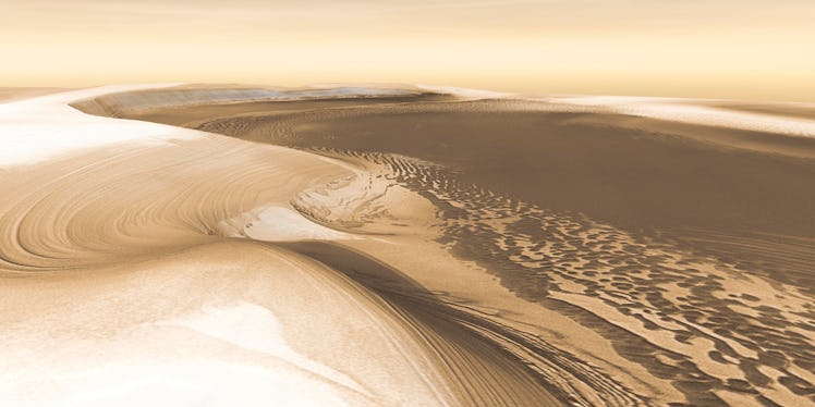 Chasma Boreale, a long, flat-floored valley, cuts deep into Mars' north polar ice cap. Its walls ris...