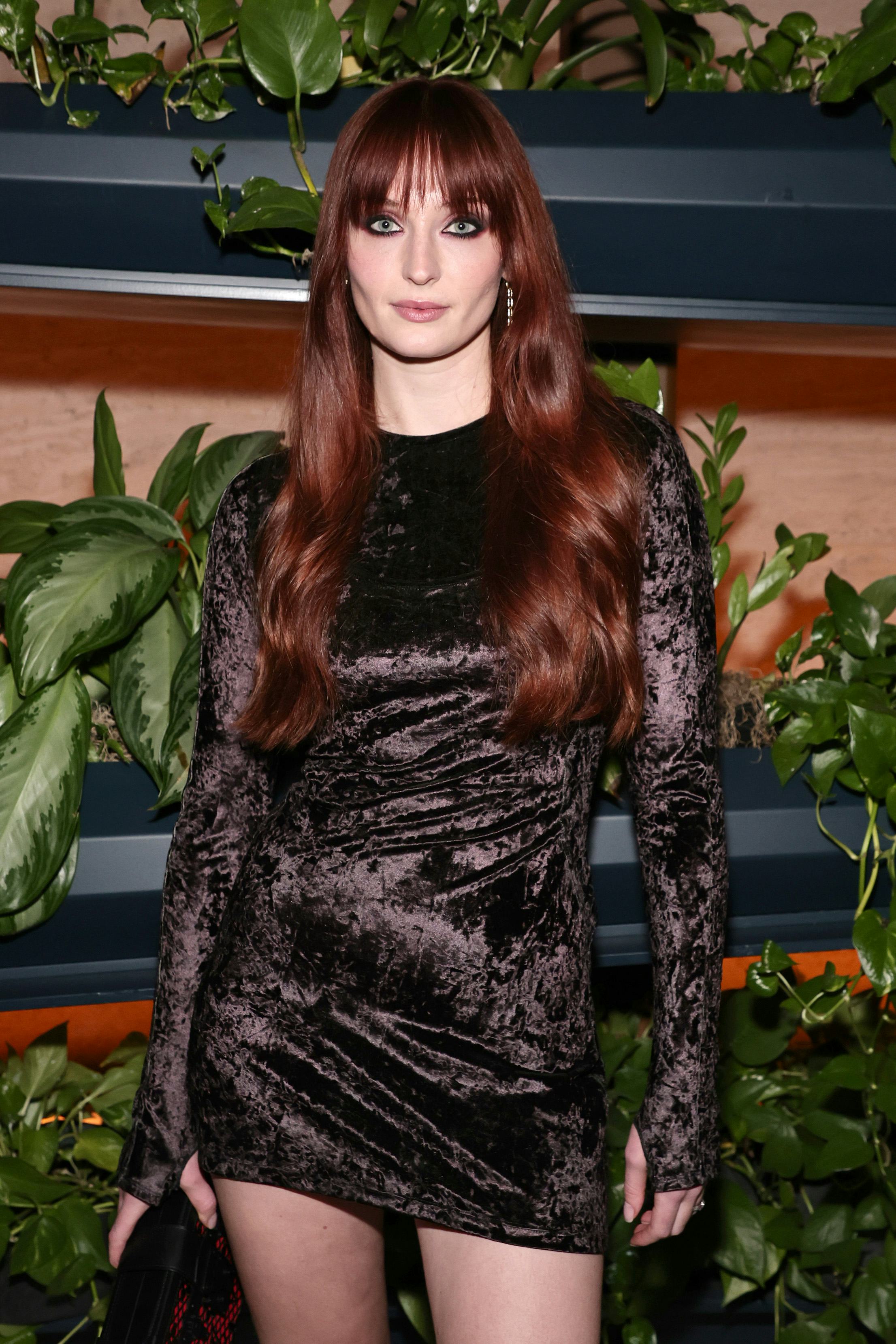Sophie Turner, wearing velvet, attends  the 2022 Women of the Year Awards on November 01, 2022 in Ne...
