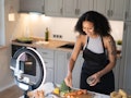 A woman makes a side dish for Whole Foods' Next Hot Bar Star holiday contest, where you could win a ...
