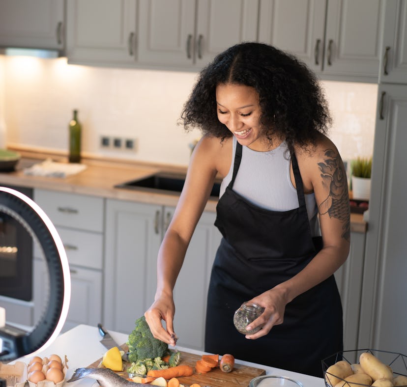 A woman makes a side dish for Whole Foods' Next Hot Bar Star holiday contest, where you could win a ...