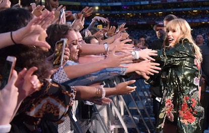 Taylor Swift greets fans during her reputation Stadium Tour.