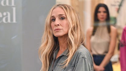 Sarah Jessica Parker wearing a blue-gray utility jumpsuit.