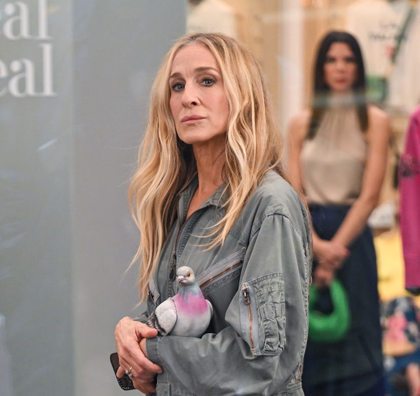 Sarah Jessica Parker wearing a blue-gray utility jumpsuit.