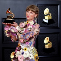 Los Angeles, CA - March 14: 
Taylor Swift with her Grammy on the red carpet at the 63rd Annual Gramm...