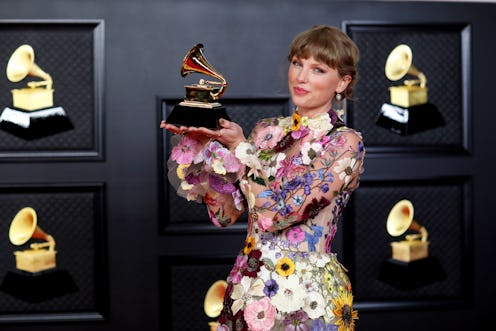 Los Angeles, CA - March 14: 
Taylor Swift with her Grammy on the red carpet at the 63rd Annual Gramm...