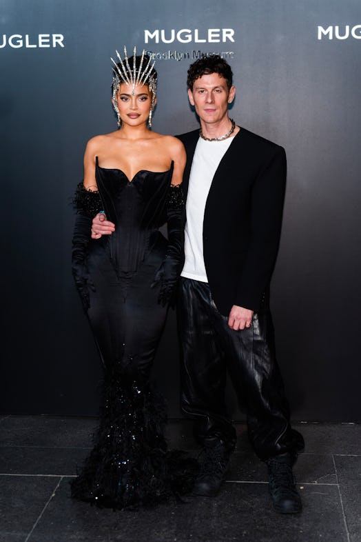 Kylie Jenner (L) and Casey Cadwallader attend the Thierry Mugler: Couturissime exhibition opening ni...