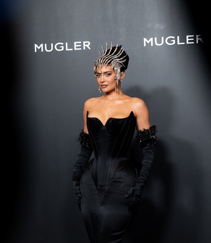 Kylie Jenner, wearing a spiked tiara, attended the Thierry Mugler: Couturissime Exhibition Opening N...