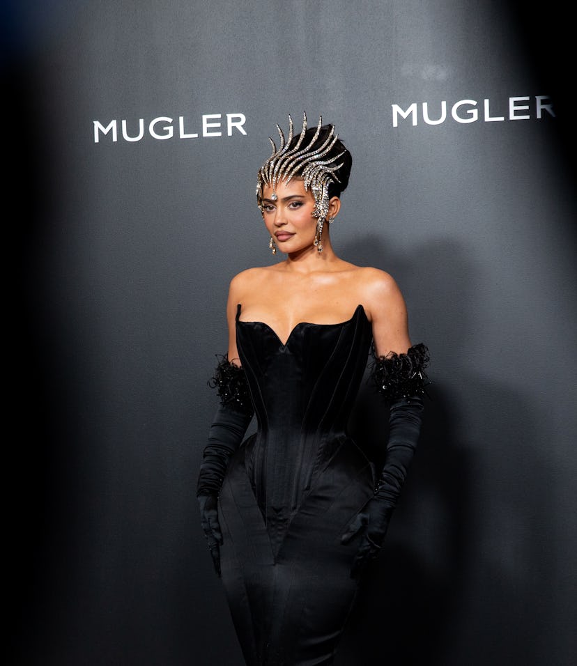 Kylie Jenner, wearing a spiked tiara, attended the Thierry Mugler: Couturissime Exhibition Opening N...