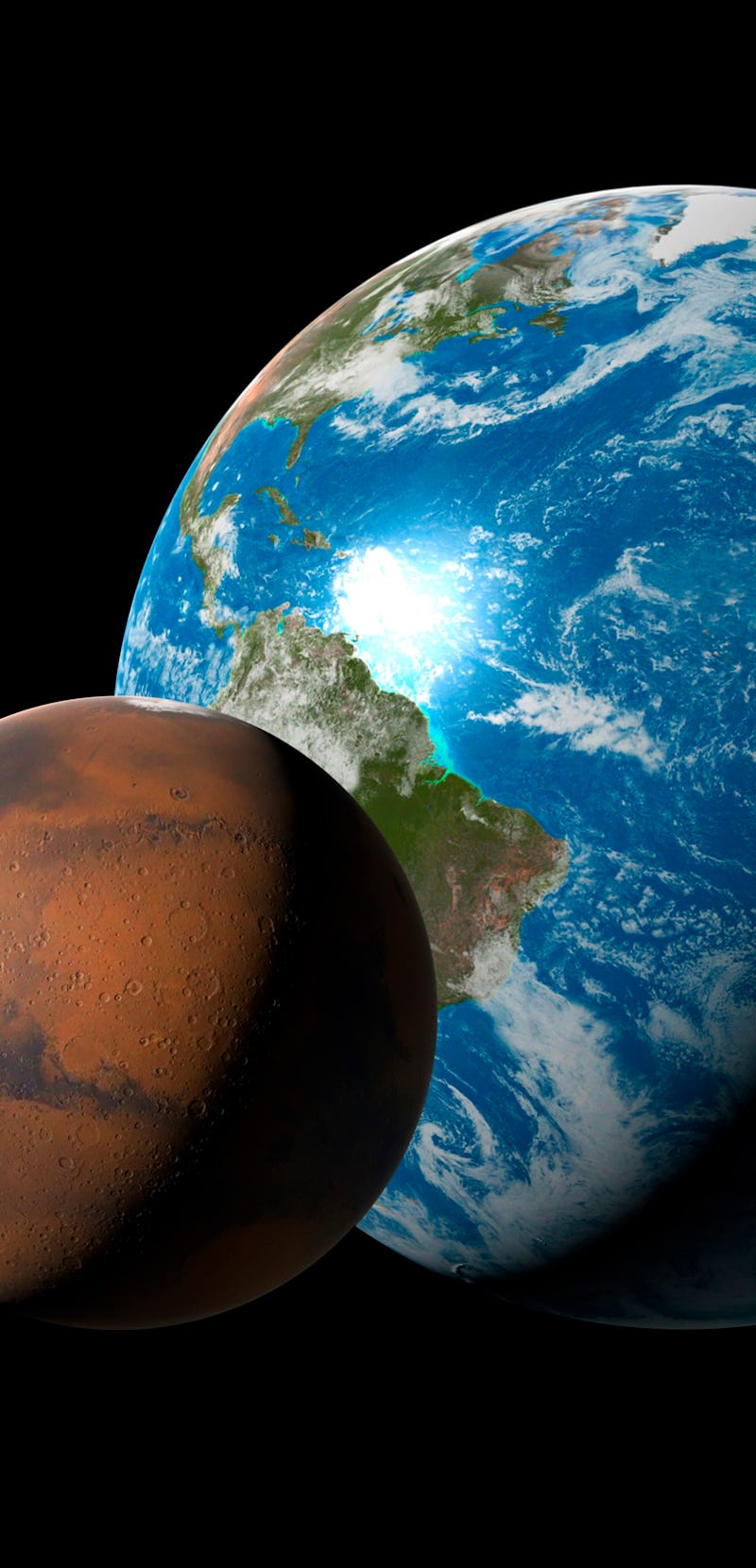 Computer illustration comparing the size of Mars (left) with that of the Earth. Mars' diameter is 53...
