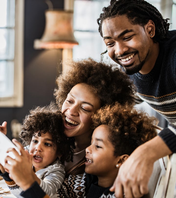 Family having fun while taking a selfie on Thanksgiving in a list of thanksgiving turkey instagram c...