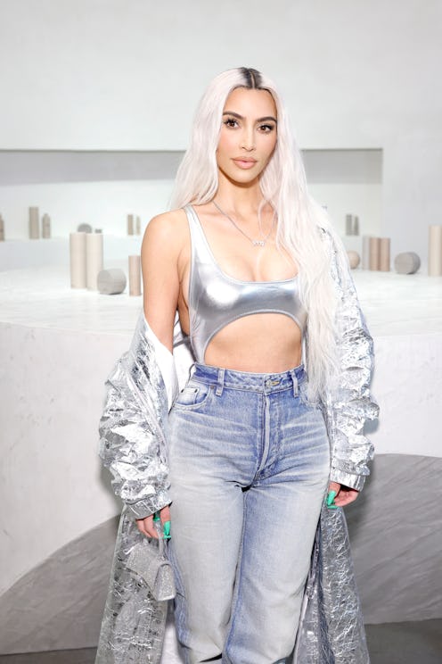 Kim Kardashian wears neon green stiletto nails and visits the SKKN by KIM holiday pop-up store in No...