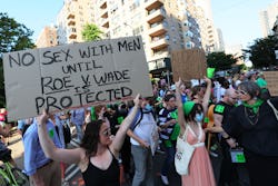 NEW YORK, NEW YORK - JUNE 24: People march as they protest the Supreme Courts 6-3 decision in the Do...