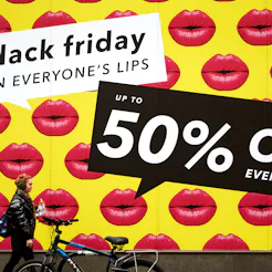 LONDON, UK - NOVEMBER 23: A shop front displays its Black Friday sales in Oxford Circus on November ...