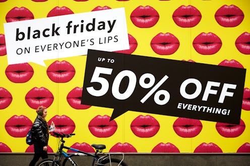 LONDON, UK - NOVEMBER 23: A shop front displays its Black Friday sales in Oxford Circus on November ...