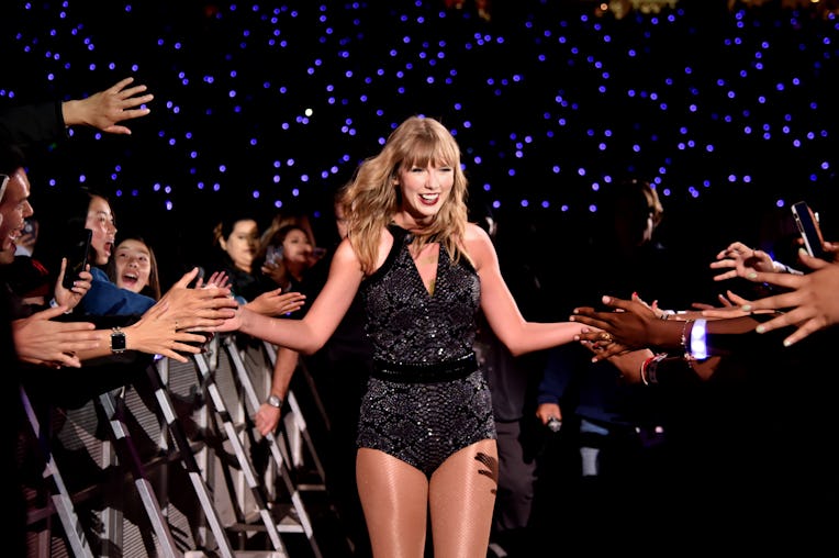 SANTA CLARA, CA - MAY 11: Taylor Swift high-fives fans during Taylor Swift reputation Stadium Tour ...