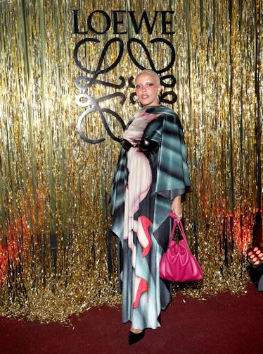 Doja Cat Wears a Painting Wrapped Around Her to Loewe Store Opening