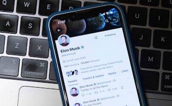 JAPAN - 2022/11/15: In this photo illustration, Elon Musk's Twitter account is seen displayed on a s...