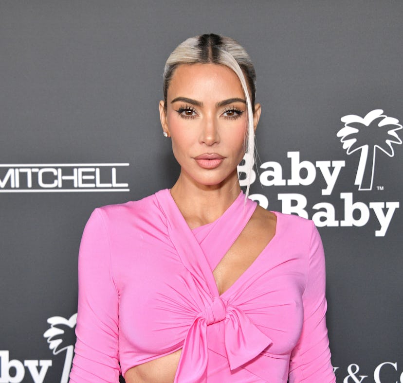 Kim Kardashian hinted at being in a "hard place" amid Pete and EmRata dating rumors.