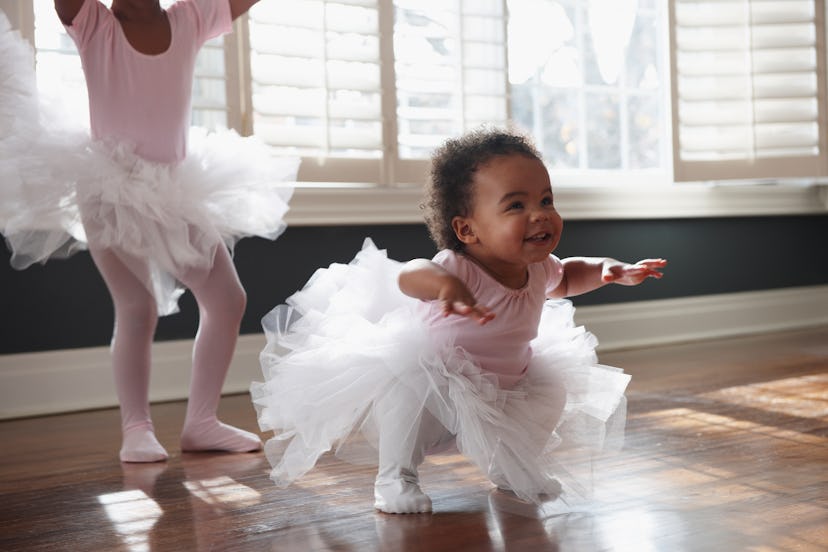 a little toddler in a ballerina outfit in a list of baby girl names that start with K